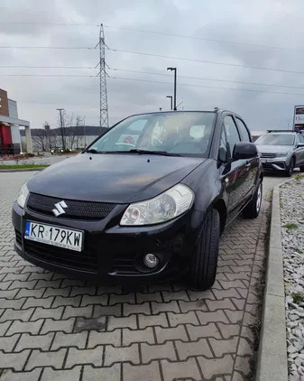 samochody osobowe Suzuki SX4 cena 15900 przebieg: 168100, rok produkcji 2009 z Kraków